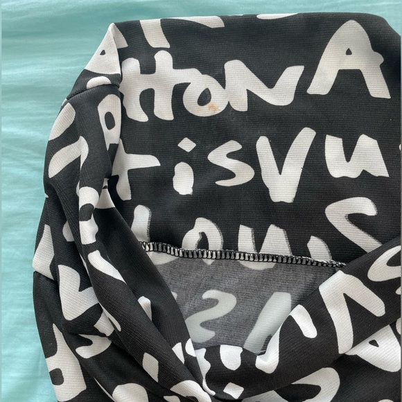 Mini Dress with Alphabet Prints and a Bow Tie - Picture 11 of 11